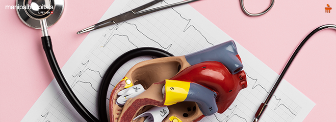Patient recovering after angioplasty with doctor guidance on aftercare and recovery tips