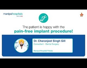 The patient is happy with the pain-free implant procedure