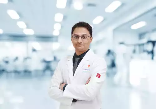 Dr. Mallesh M