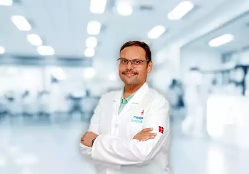 Dr. Anand M