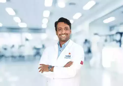 Dr. Manu T S