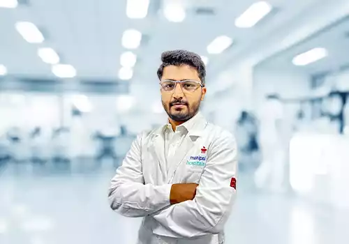 Dr. Umesh K J